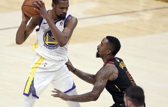 K.Durantas džiaugiasi, kad yra pastebimas NBA čempionų gretose (Scanpix nuotr.)