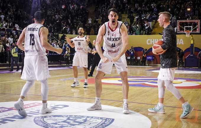 D.Amigo švenčia pergalę prieš JAV rinktinę (FIBA nuotr.)